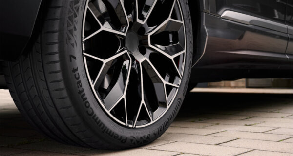 A Continental Premium Contact tyre on car sat on a drive