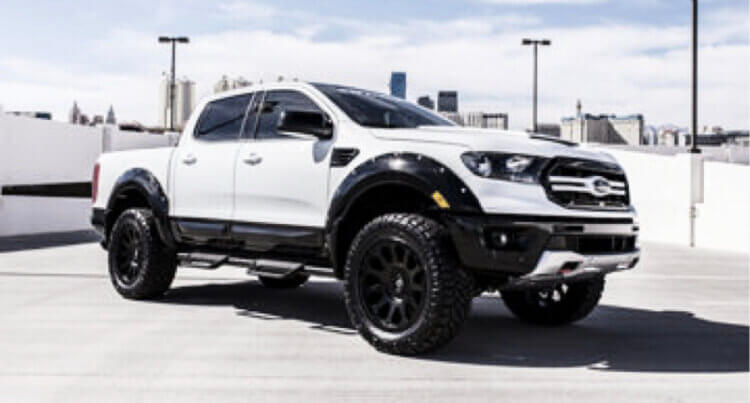 A white Ford Ranger sat on Fuel Offroad wheels Design Excellence and Engineering