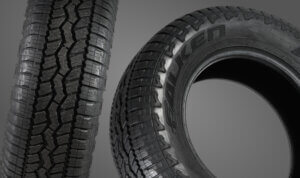 An image of a tire with the brand name "Falken Wildpeak AT3WA" written on it, designed for all-terrain use and recommended for towing purposes