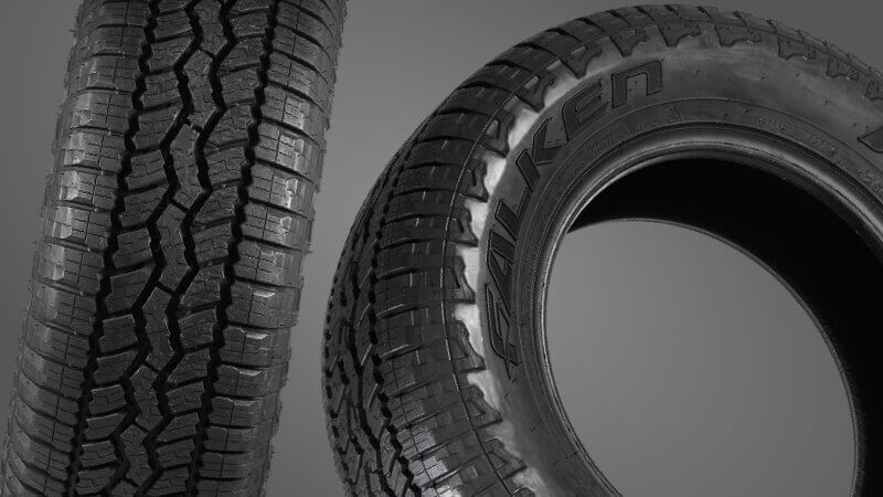 An image of a tire with the brand name "Falken Wildpeak AT3WA" written on it, designed for all-terrain use and recommended for towing purposes