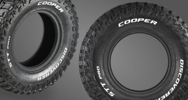 Mud terrain tires with white lettering.