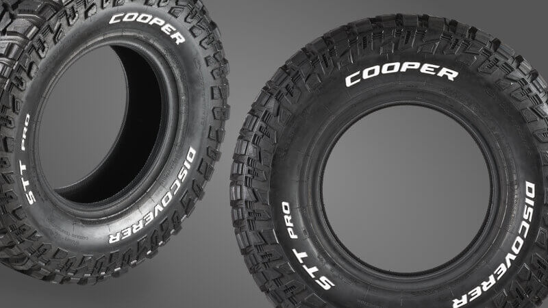 Mud terrain tires with white lettering.