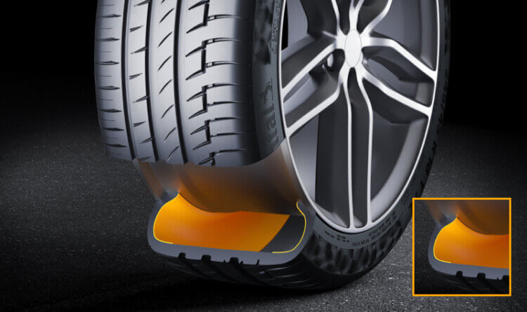 a cross section of a continental tyre. Orange to illustrate the run run flat technology