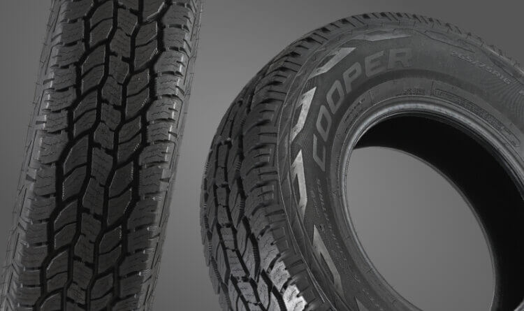 A Cooper AT3 Sport 2 all terrain tyres uk on a grey background