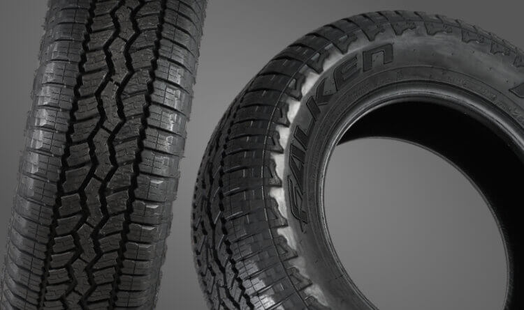 A Falken AT3WA all terrain tyres uk tyre on a grey background