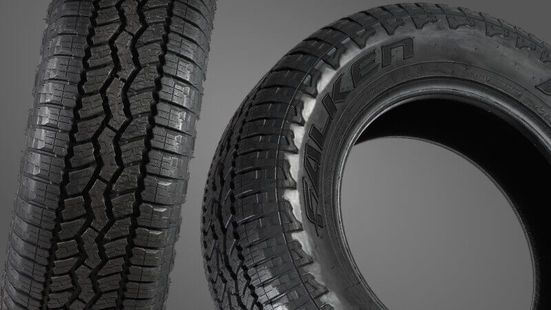 A Falken AT3WA all terrain tyres uk tyre on a grey background