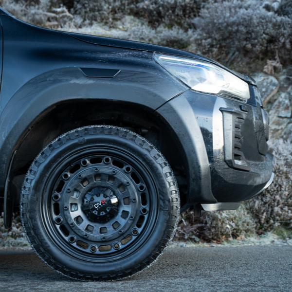 A Toyota Hilux sat on DV8 alloy wheels and 4x4 tyres uk