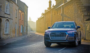 Best-SUV tyres for me Audi driving down a road