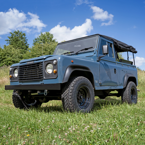 A land rover defender sat on tuff torque steel wheels and 4x4 tyres uk