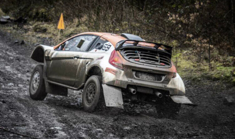 Off-road Legend Dave Hooper vehicle going sideways in the mud to show he always Stays in Control