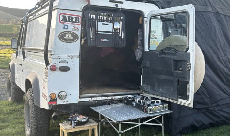 a land rover with its back door open ready to some cooking