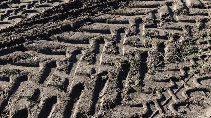 Tyre tacks in heavy mud to illustrate Choosing the Right Tyre for Your 4x4