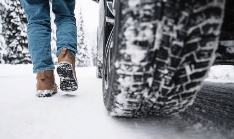 Tyre Types Decoding the Patterns showing a winter tyre tread in snow