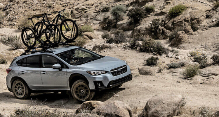 A SUV car offloading over rocky terrain sat on Falken Tyres Falken Falken SUV Tyres