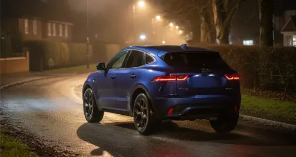 The back end of a Jaguar E Pace showing off its Jaguar E Pace wheels