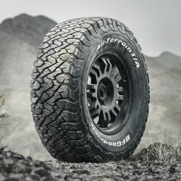 a bfgoodrich tyre sat on hard rocks