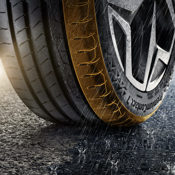 Close-up of Continental PremiumContact 7 tyre showing wet-road grip technology