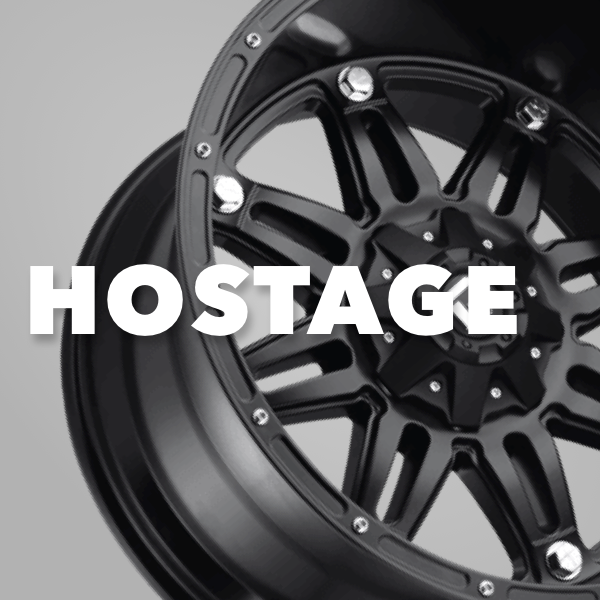 Close-up of a black Fuel Hostage alloy wheel