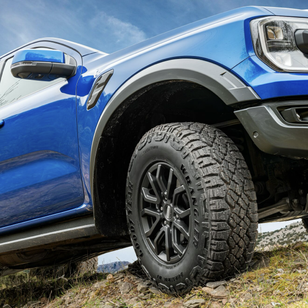 Close-up of Goodyear Wrangler DuraTrac tyre fitted to a blue Ford Ranger