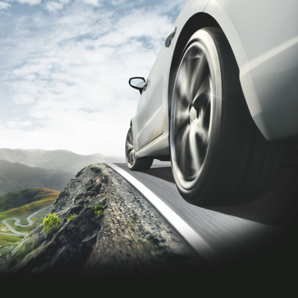 Close-up of Continental CrossContact LX Sport tyre on an SUV driving on a mountain road
