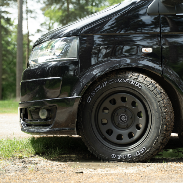 Comforser CF1100 all-terrain tyre with mud and debris around the tread