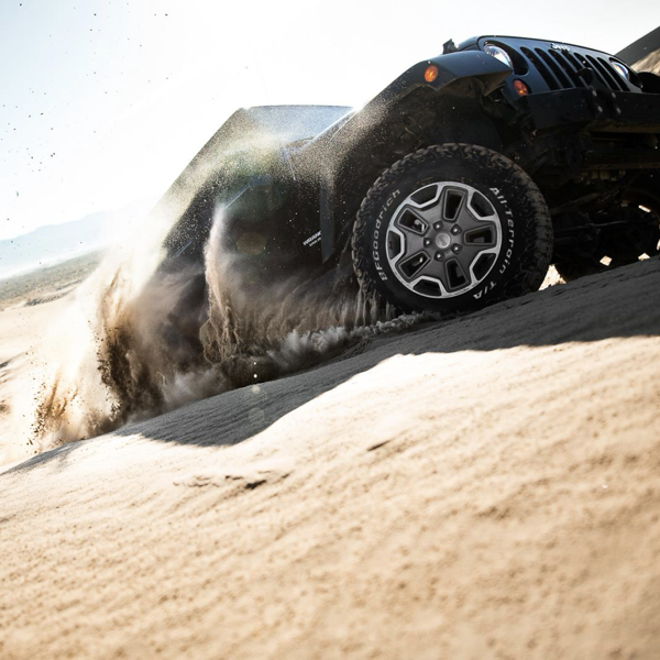 Jeep climbing a sand dune on BFGoodrich KO2 all-terrain tyres