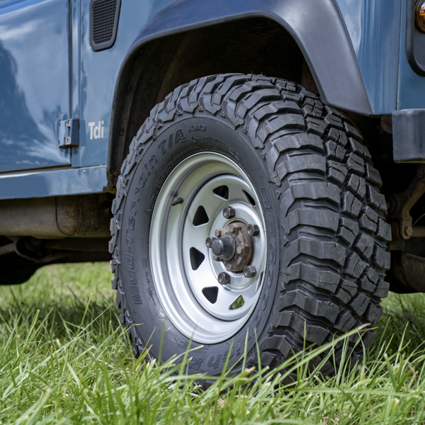 Land Rover Defender fitted with silver Tuff Torque 8 Spoke steel wheels