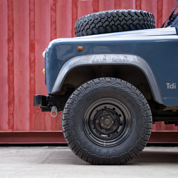 Land Rover Defender fitted with black Tuff Torque Modular steel wheels
